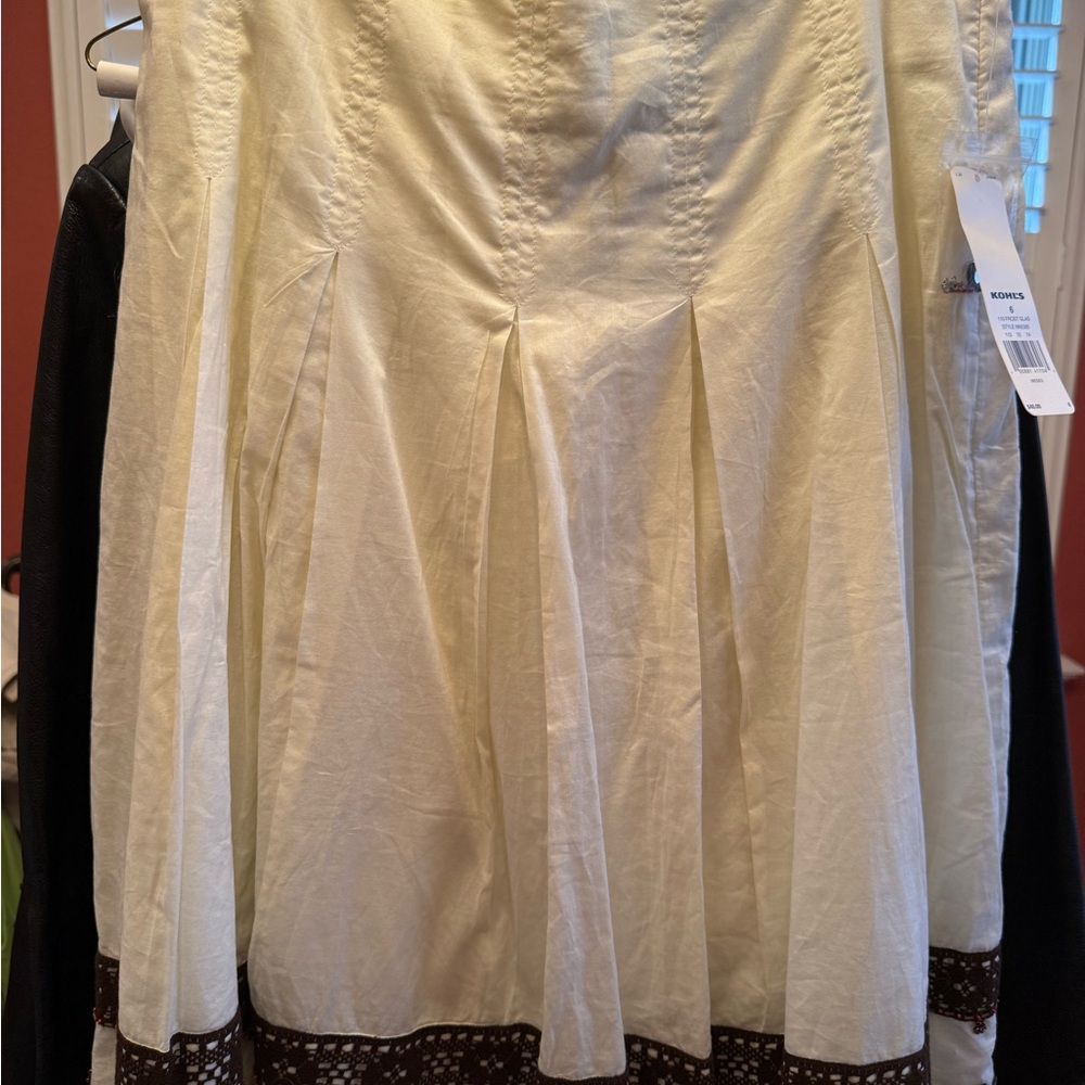 Elegant Cream Skirt with Brown Trim